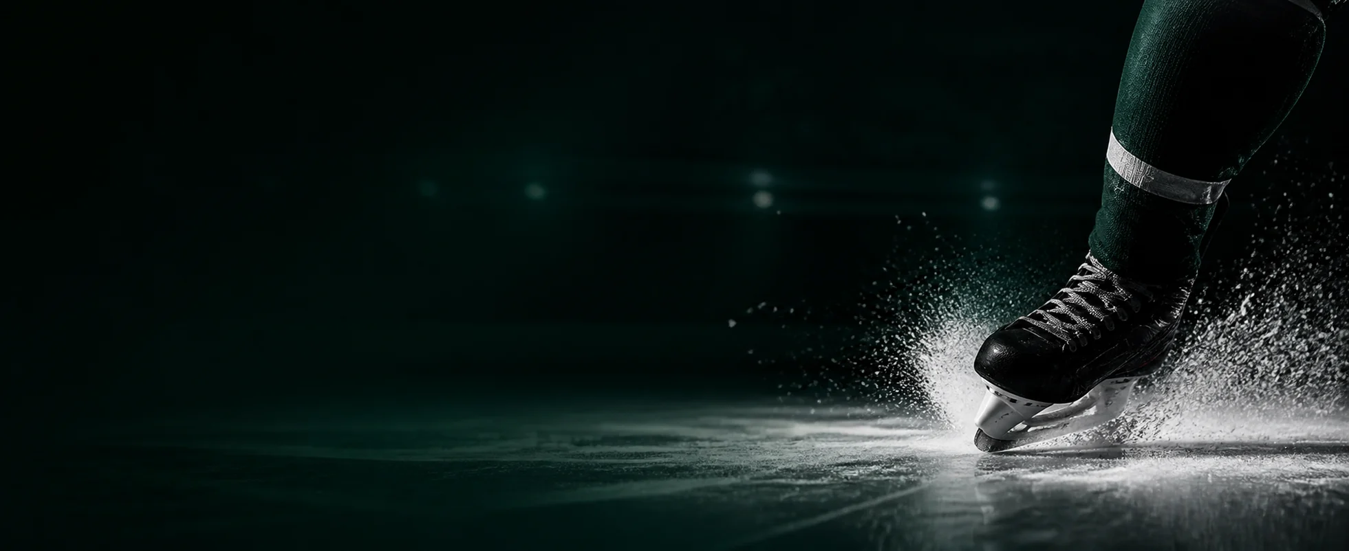 Hockey skate cutting across the ice